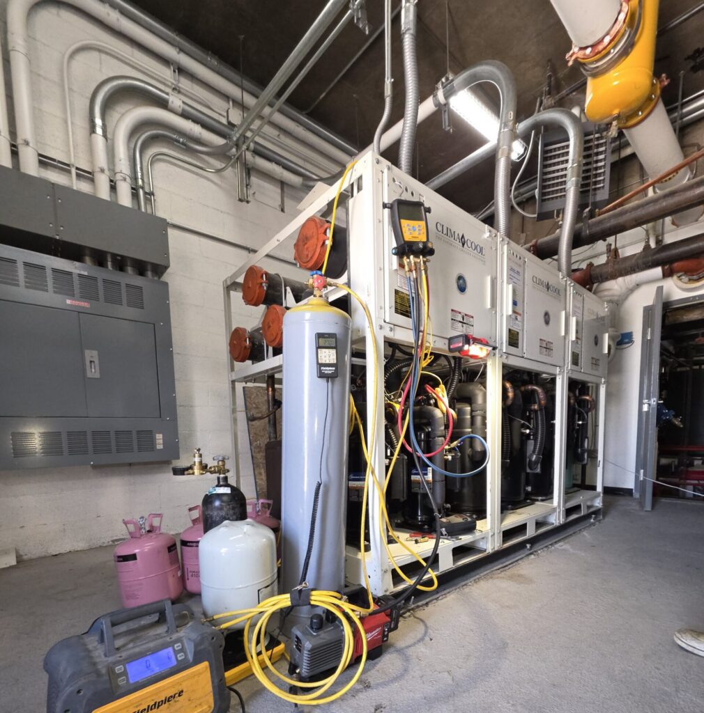Chiller exposed, panels taken off for preventative maintenance by Mountain Hydronics